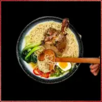 Wagamama Duck Ramen — shredded duck in miso broth with ramen noodles, bok choy, and spring onions.