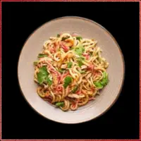 Wagamama Ginger Chicken Udon — thick udon noodles stir-fried with ginger-marinated chicken and seasonal greens.