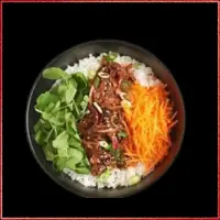 Wagamama Spicy Beef Bowl — stir-fried beef in spicy sauce served with jasmine rice, red chillies, and greens.