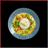 Wagamama Tofu Raisukaree Curry — fragrant coconut curry with crispy tofu, vegetables, fresh lime, chilli, and jasmine rice.