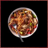 Wagamama Yasai Yaki Soba — vegan yaki soba with mushrooms, peppers, spring onions, and sesame seeds.